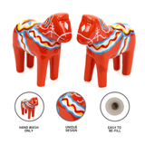 The Red Swedish Dala Horse Salt and Pepper Shakers showcase colorful patterns reflecting Swedish charm, featuring icons for Hand Wash Only, Unique Design, and Easy to Refill.