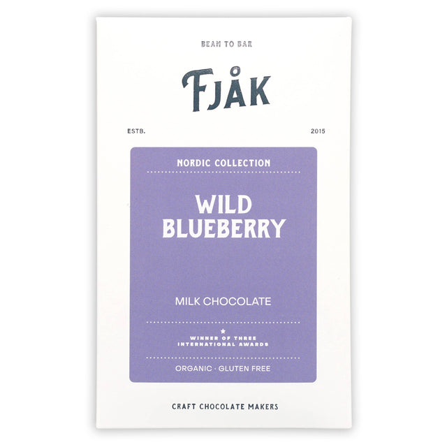 The Fjåk Nordic Collection Milk Chocolate Bar with Wild Blueberry 50% (60g) is an award-winning, organic, gluten-free Norwegian craft chocolate, packaged with a purple label.