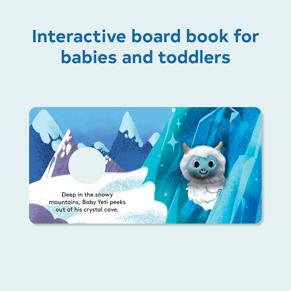 A plush baby yeti finger puppet poking through a circular cutout in a board book illustrated with a crystal cave design.