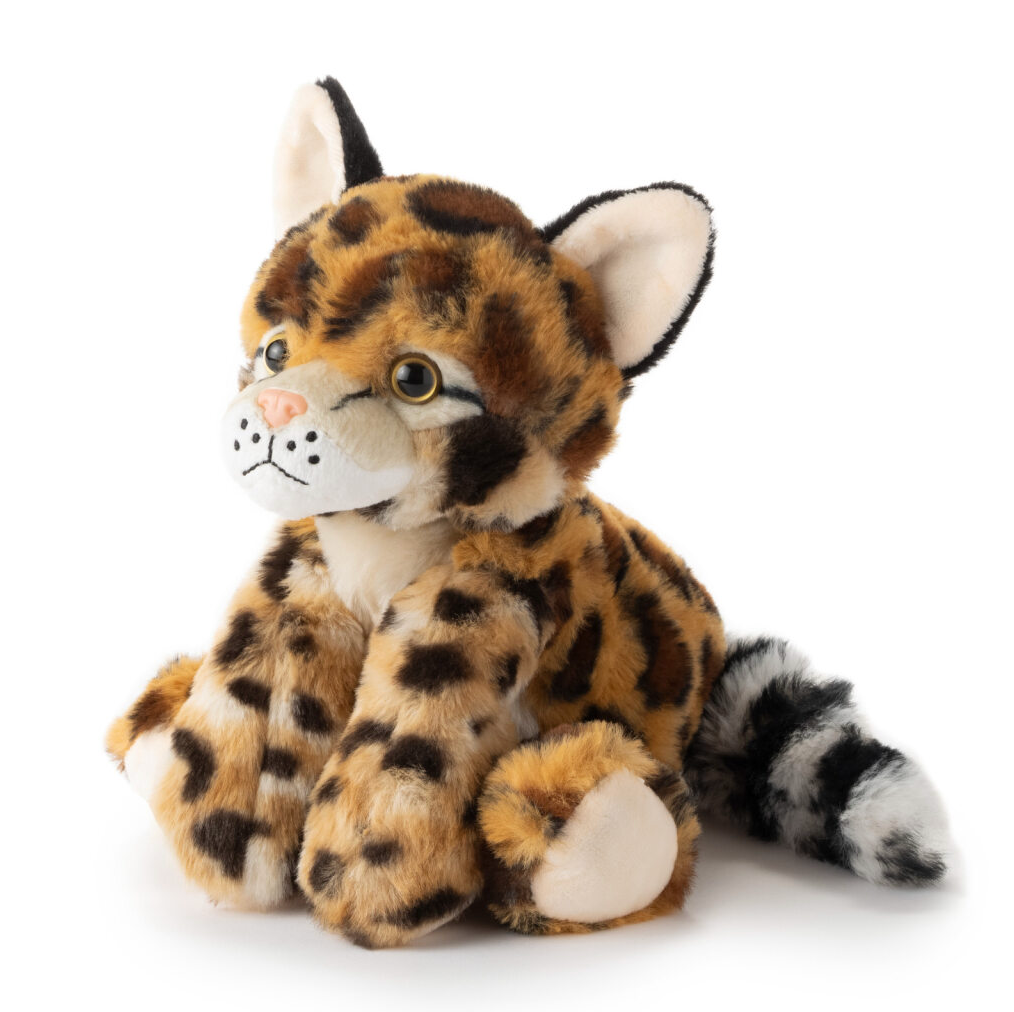 Plush ocelot toy with spotted brown fur, large ears, bright eyes, and a bushy striped tail shown sitting upright.