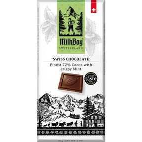 Front of a MilkBoy Switzerland 72% Cocoa with Crispy Mint chocolate bar package, showing mountain scenery, a chocolate square, mint leaves, and text highlighting its 72% cocoa content with crispy mint.