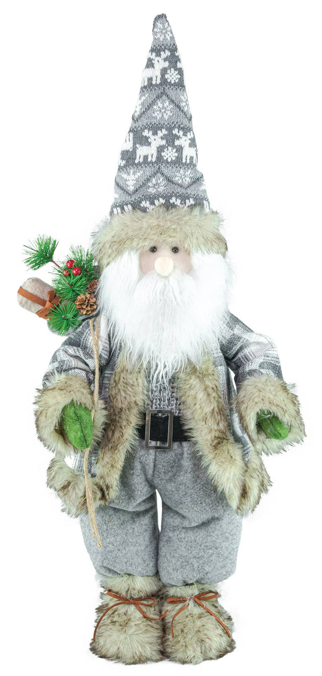 Gnome with long white beard, gray hat and coat, holding a pine branch with red berries, wearing furry mittens and boots.