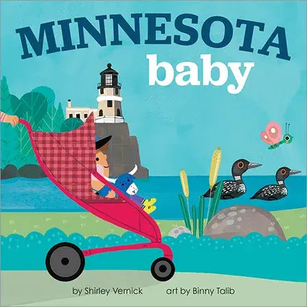 The cover of the board book “Minnesota Baby” by Shirley Vernick, with art by Binny Talib, features a baby in a red stroller near a lake surrounded by loons, trees, and a lighthouse—classic Minnesota attractions. Published by Sourcebooks, this charming children’s board book is perfect for little explorers.