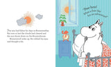 A playful Moomintroll sits up in bed with an alarm clock and plant nearby, as sun and clouds shine through the window—a whimsical scene from Moomin and the Moonlight Adventure by Tove Jansson.
