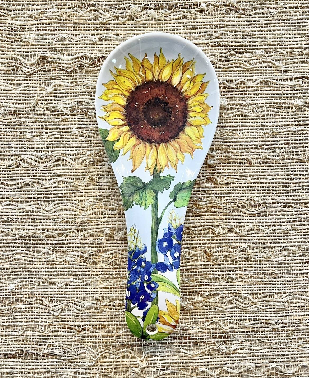 The Spoon Rest: Sunflower & Bluebonnets Floral Flowers Bamboo Spoon Rest features a vibrant sunflower and bluebonnet design, perfect for adding floral charm to your kitchen.