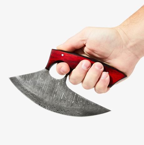 A hand holds the Knife: Alaskan Ulu Style Blade Damascus Steel Diamond Wood Handle Red & Black against a plain white background.