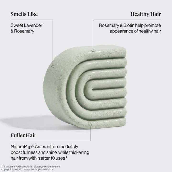 A pale green, curved shampoo bar—the Hair: Rosemary & Biotin Volumizing Hair Conditioner Bar 2.7 oz by KITSCH—is featured with text highlighting its calming lavender and rosemary scent. Specially formulated as a rosemary biotin conditioner for fine hair, it harnesses the power of NaturePep Amaranth to deliver visibly fuller, healthier hair after just 10 uses—making this KITSCH volumizing conditioner bar an ideal addition to your daily routine.