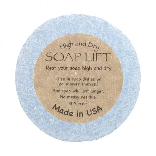 The blue Soap Lift, labeled High and Dry SOAP LIFT, is round with a brown label. Its eco-friendly, BPA-free bioplastic, made in the USA under the name Round A Bout Soap Lift Soap Saver.