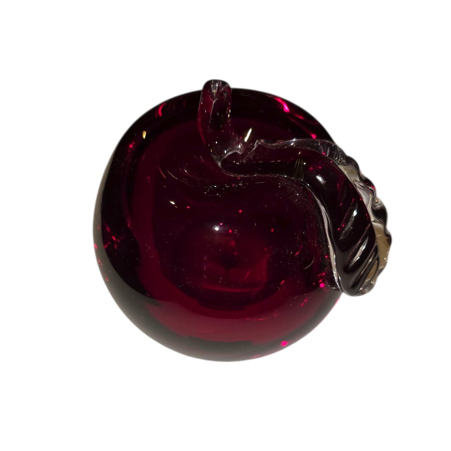 A 3-inch-tall, mouth blown Red Apple from Mantorp Glass, Sweden, with a curved stem and rich dark red color, shown against a white background.
