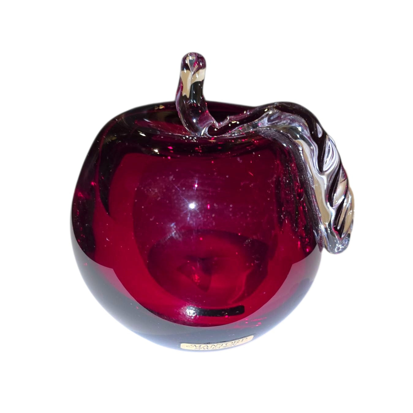The Decor: Red Apple 3 Tall Mouth Blown Glass from Mantorp Sweden features a red glass apple with a clear glass stem and leaf, expertly crafted and shown against a white background.