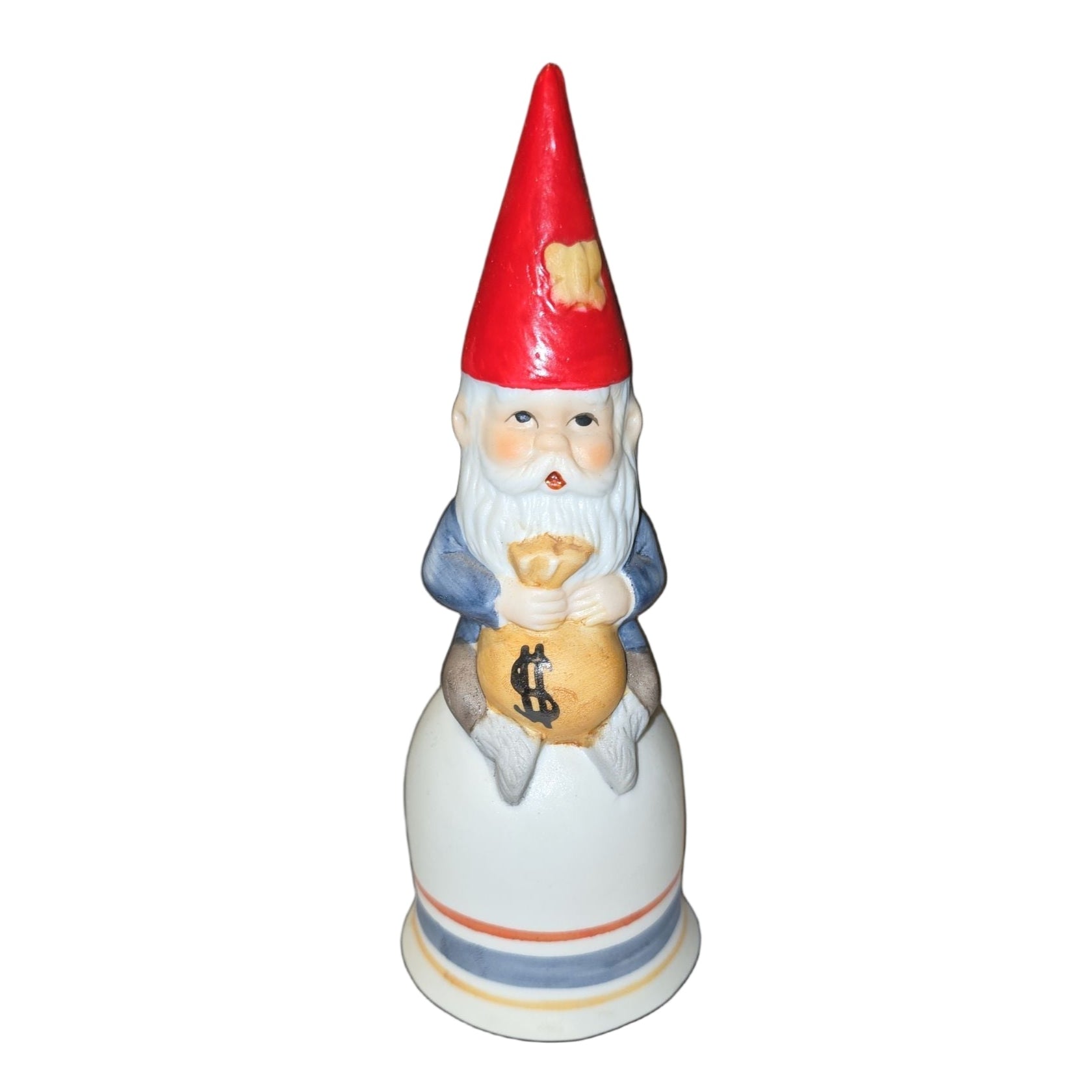 The Bell: Tomte Sitting on a Bell Holding a Bag of Money is a 5.75 tall x 2 wide figurine featuring a gnome with a red hat and money bag, shown against a black background.