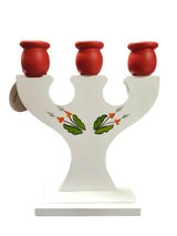 Hand crafted Swedish candle holder featuring a Dala Horse and Kurbits design, holds three candles, with a charming floral motif on the front and stands on a rectangular base.