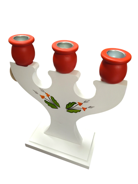 This hand-crafted Swedish candle holder features a white wooden design with a Dala horse, Kurbits floral accents, and holds 3 candles.