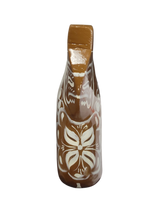 The Dala Horse: Swedish Dala Horse in brown with white kurbits is a handcrafted ceramic piece from Sweden, featuring a floral decorative design and traditional artistry.