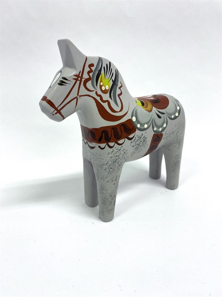 The Dala Horse: "Love Horse" Karlekshast 13cm (5" Approx) features traditional Swedish painted patterns and stands out as a charming piece of handmade Swedish decor.