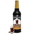 A 750 ml bottle of Syruvia Swiss Chocolate Mocha Syrup with Pure Cane Sugar is beside a glass of chocolate mocha topped with whipped cream and chocolate curls; this gluten-free syrup adds indulgence to drinks.