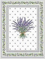 Bouquet of lavender tied with twine on a white background with polka dots, bordered by green decorative leaves.