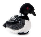 The Earth Keeperz Loon Plush is a 12 long by 10 high sustainable stuffed animal, featuring black, white, and grey coloring with red eyes and a pointed beak. Made from recycled plastic. Shown against a white background.
