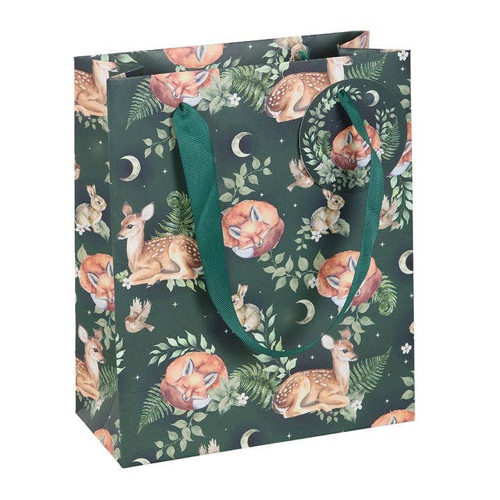 Gift Bag: Fawn and Friends Forest Animal Print Medium Gift Bag features deer, foxes, rabbits, birds, leaves, moons on a green background with green fabric handles and a round gift tag.