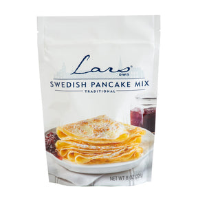 A package of Lars Own Swedish Pancake Mix (8oz) featuring an image of folded pancakes with powdered sugar and jam on a white plate—a delightful Scandinavian treat.