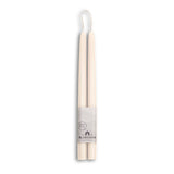 Two 10 eco-friendly, dripless, and handmade white beeswax taper candles are tied together with a Bluecorn Beeswax label featuring a mountain design, stating 100% Pure, ensuring a clean and sustainable burn for any occasion.