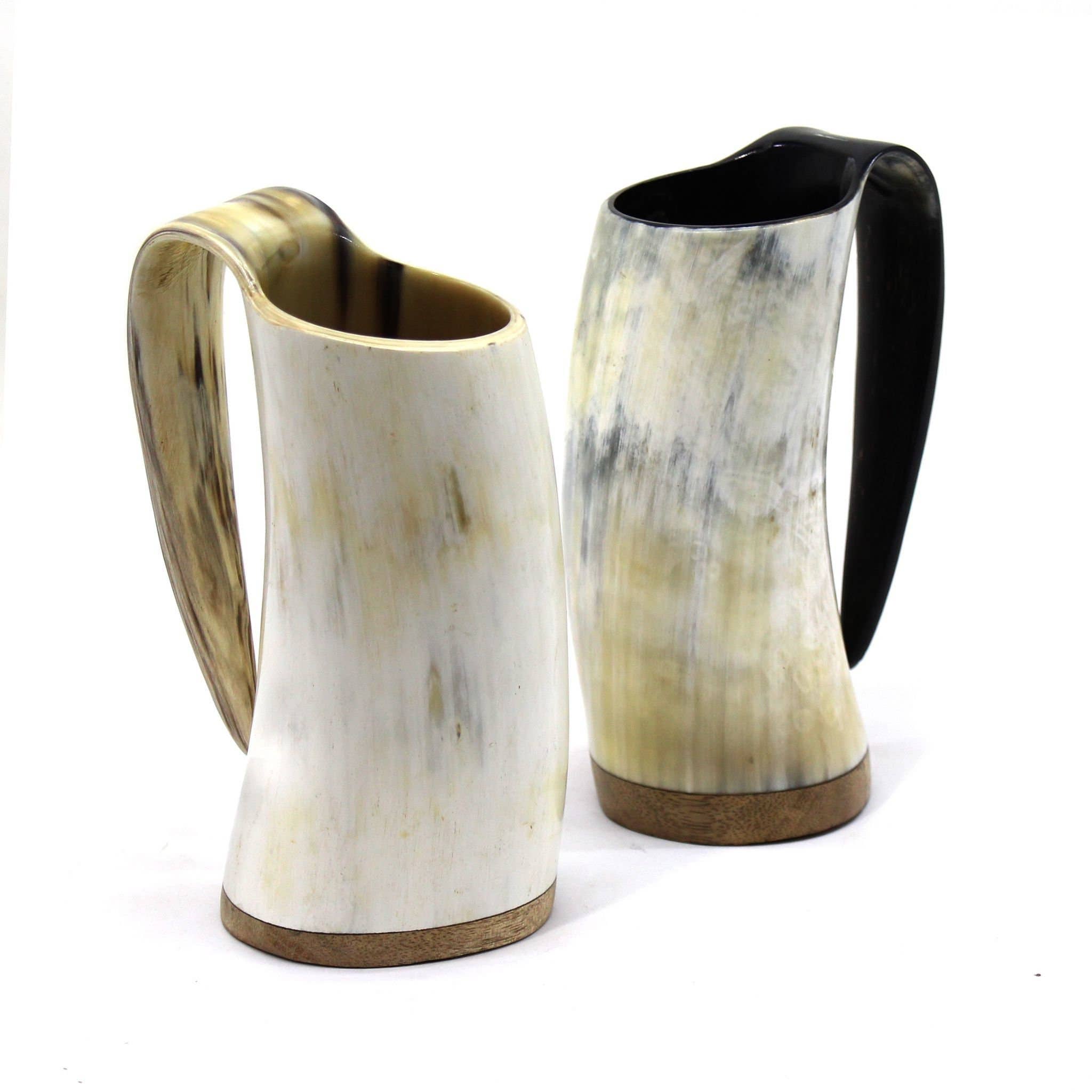 The Viking African Ox Horn Mug collection features two stunning curved horn mugs, each with a glossy finish and wooden bases. One has a lighter hue, while the other is darker, both elegantly displayed against a white background. These mugs are named the Horn Mug: Viking African Ox Horn Mug - 100% Authentic Beer Ox Horn Tank 16oz.