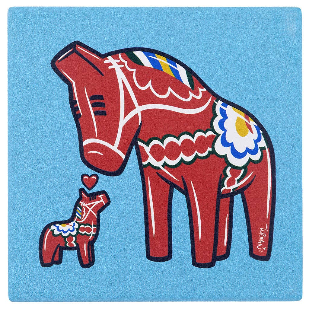 Featuring art by Adam Turman, the 4x4 stone Dala Horses Coaster shows two red Dala horses with decorative patterns and a heart above them on a blue background. This coaster includes cork backing for added durability.