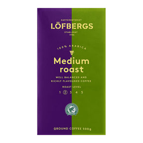 Purple and green Lofbergs Medium Roast Coffee bag, made from 100% Arabica beans with a roast level of 3 out of 5. It is Rainforest Alliance-certified for sustainability and weighs 17.6 oz (500g).