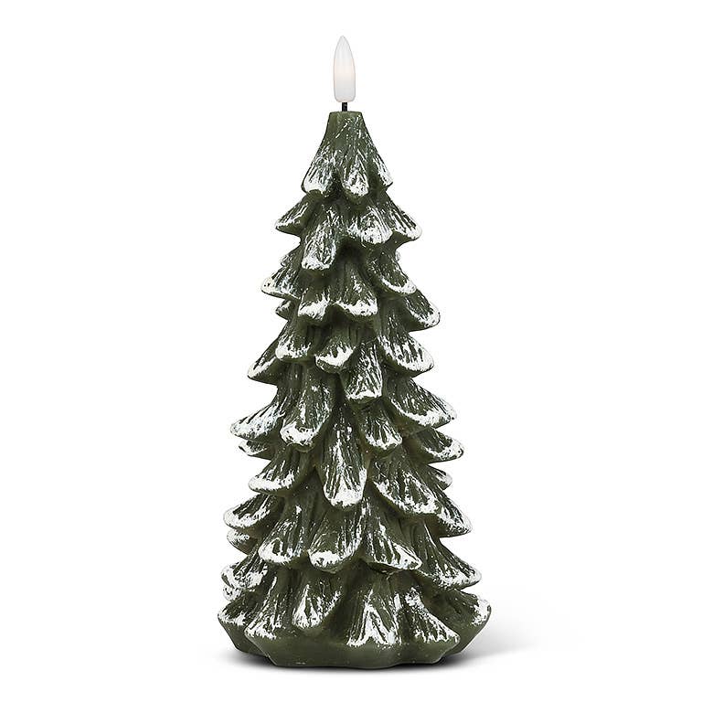 The Snowy Tree LED Candle (9"H) provides an ambient glow with its green, snow-dusted branches, making it perfect for a holiday setting.