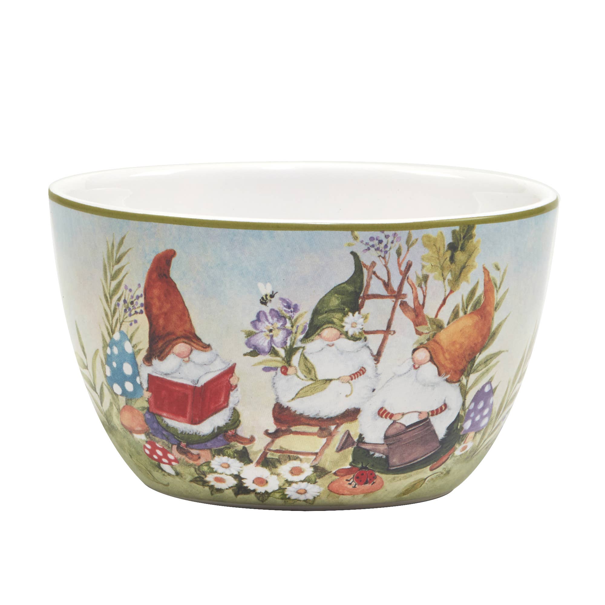 The Garden Gnome Ice Cream Bowl features charming images of three gnomes: one reading, another with flowers, and a third watering plants, surrounded by vivid mushrooms and flowers. Dimensions are 5.25in x 3in.