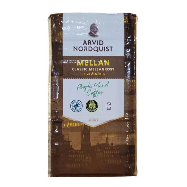 A 17.6oz package of Arvid Nordquist Classic Mellanrost Ground Coffee, made with 100% Arabica beans and certifications, featuring People, Planet, Coffee on the front. This Swedish coffee is medium-roasted for a delightful experience.