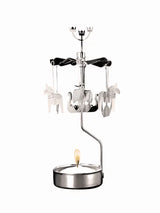 The Pluto Design Sweden Rotary Candle Holder "Sweden" features a silver carousel with Viking ships and Dala horses that spin from the heat of a tealight below.