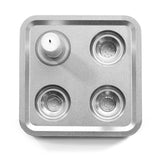 The Stumpastaken Fyran Four Candle Holder is a square, white powder-coated holder made from 100% recycled material—perfect for sustainable Swedish interior decor and holding four candles or tealights.