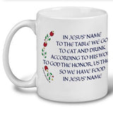 White 11 oz ceramic coffee mug featuring the Norwegian Table Prayer in both Norwegian and English, with red and green Scandinavian accents. Perfect for enjoying drinks with a meaningful blessing.