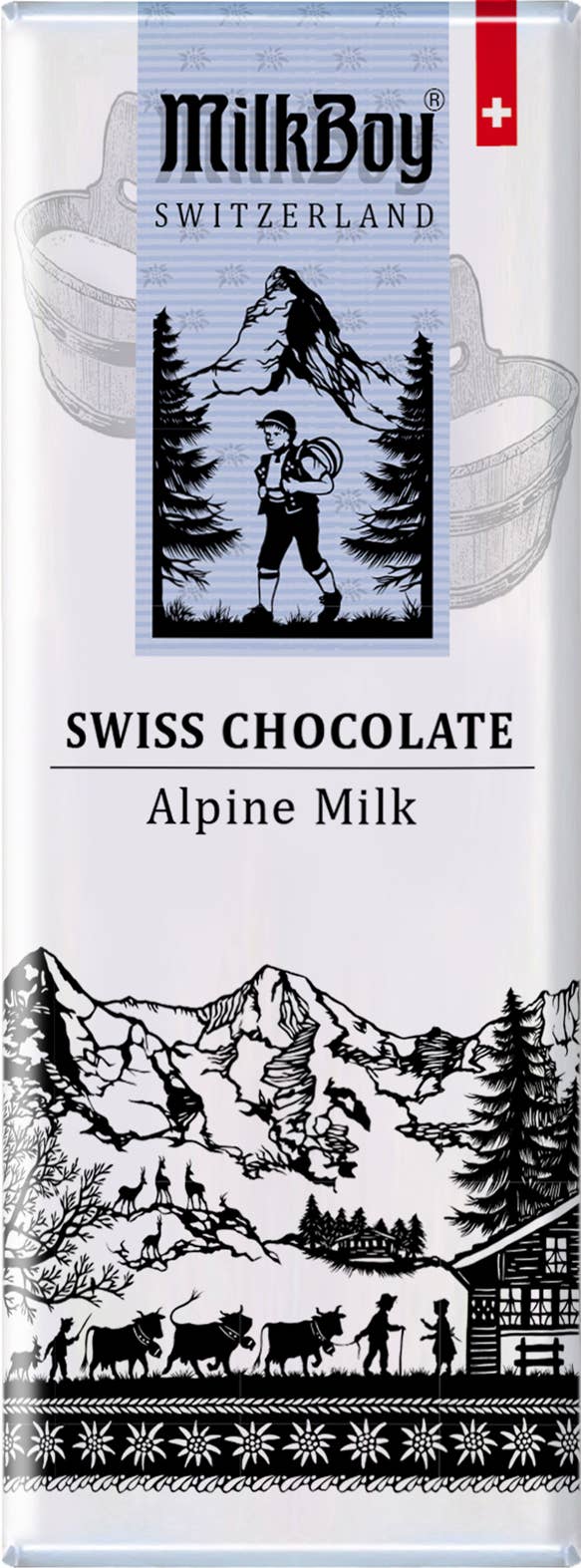 The 1.4oz MilkBoy Alpine Swiss Milk Chocolate bars packaging features charming Alpine scenery, including a herdsman, cows, majestic mountains, trees, and the iconic Swiss flag. Made with Rainforest Alliance Certified milk chocolate, this treat is crafted with care.