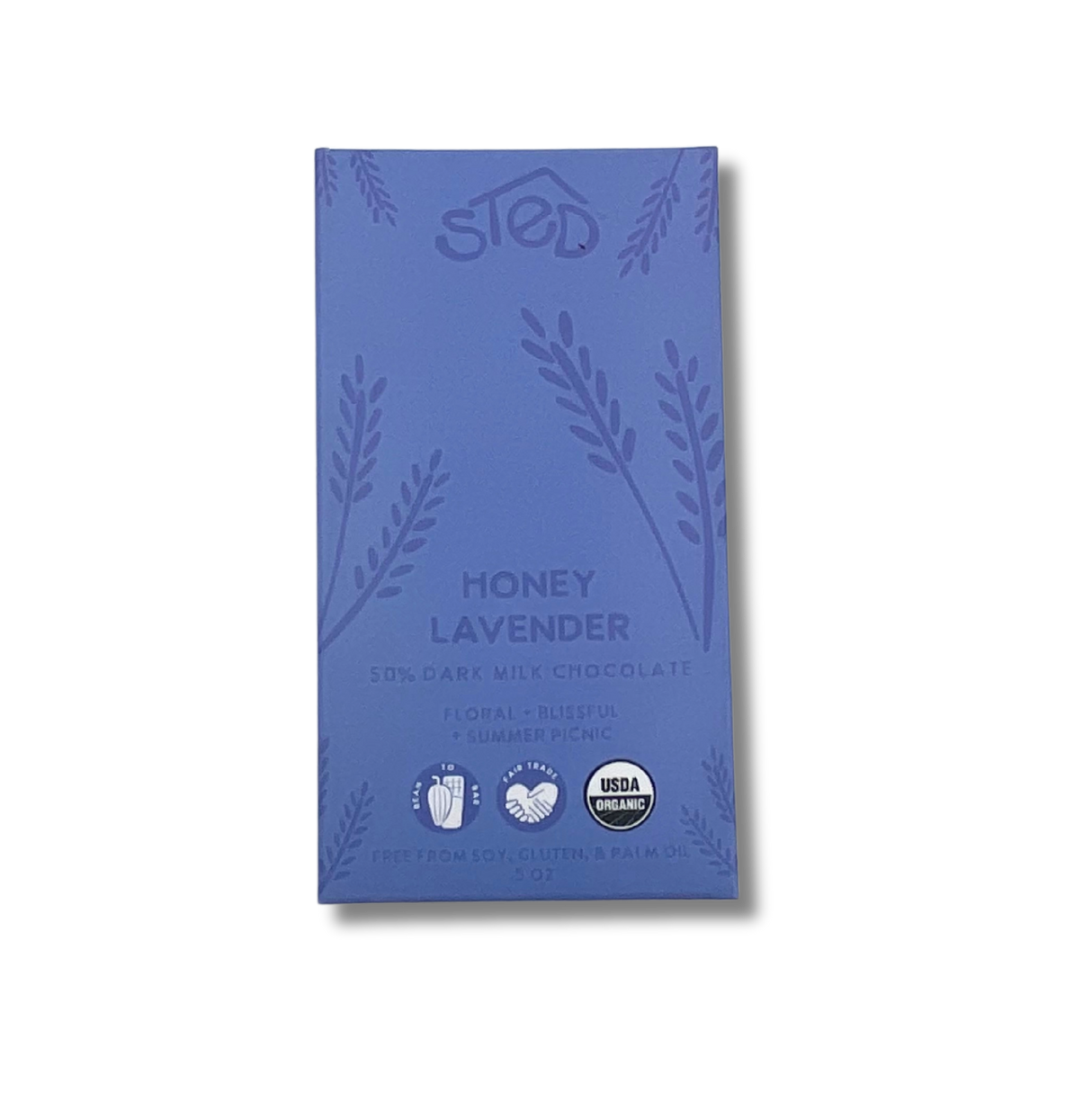 Purple chocolate wrapper with “Honey Lavender” text, floral patterns, and icons indicating organic, soy-free, gluten-free, and palm oil–free.