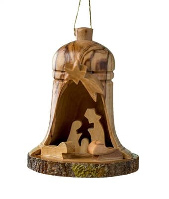 Bell-shaped olive wood ornament with carved nativity figures beneath a star, hanging by a thin string.