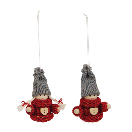 Pair of hanging Christmas gnome ornaments with red sweaters featuring heart buttons, gray knit hats, and attached string loops.