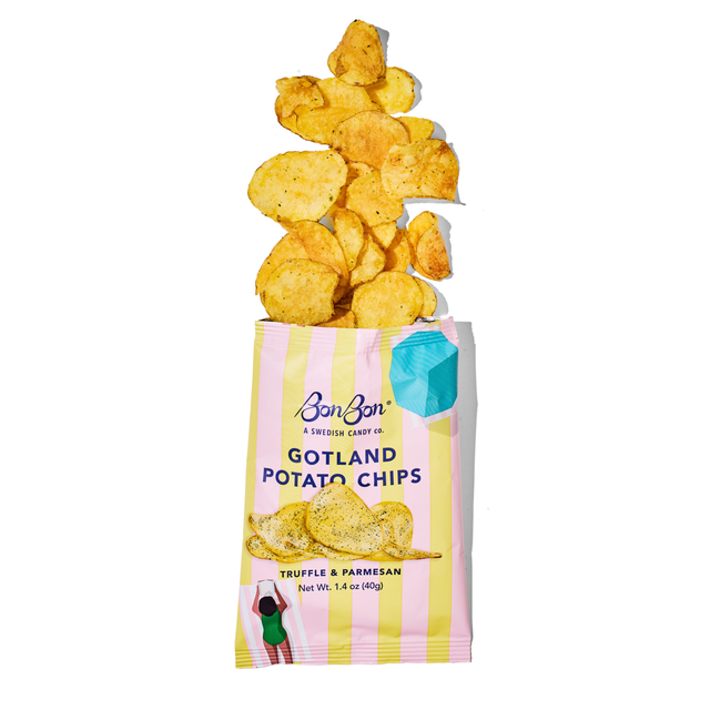 Tear open the pink and yellow bag of BonBon - A Swedish Candy Co’s Truffle and Parmesan Potato Chips, made in Sweden (1.4 oz / 40g), with golden crisps spilling across a white background—a premium Scandinavian snack perfect for anyone craving irresistible truffle chips.