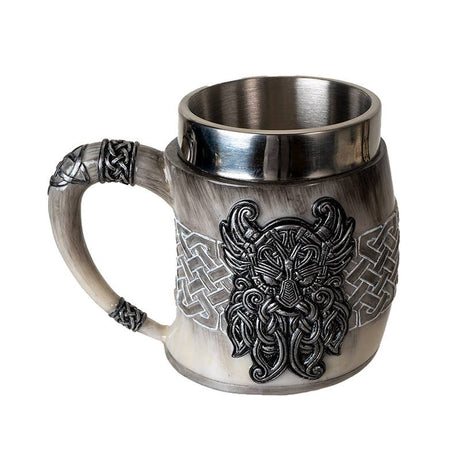 The Coffee Mug: Viking Odin's Horn Drinking Mug features a metal and resin build with Celtic knot designs and a Viking face—an ideal novelty gift for Norse mythology fans.