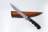 Damascus fillet knife with a dark textured handle placed diagonally on a brown leather sheath, displayed on a white surface.