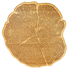 The Tree of Life Bamboo Serving Board is a 13 wooden board shaped like a tree cross-section, featuring visible growth rings and 800+ engraved silhouettes of exotic and endangered animal species.