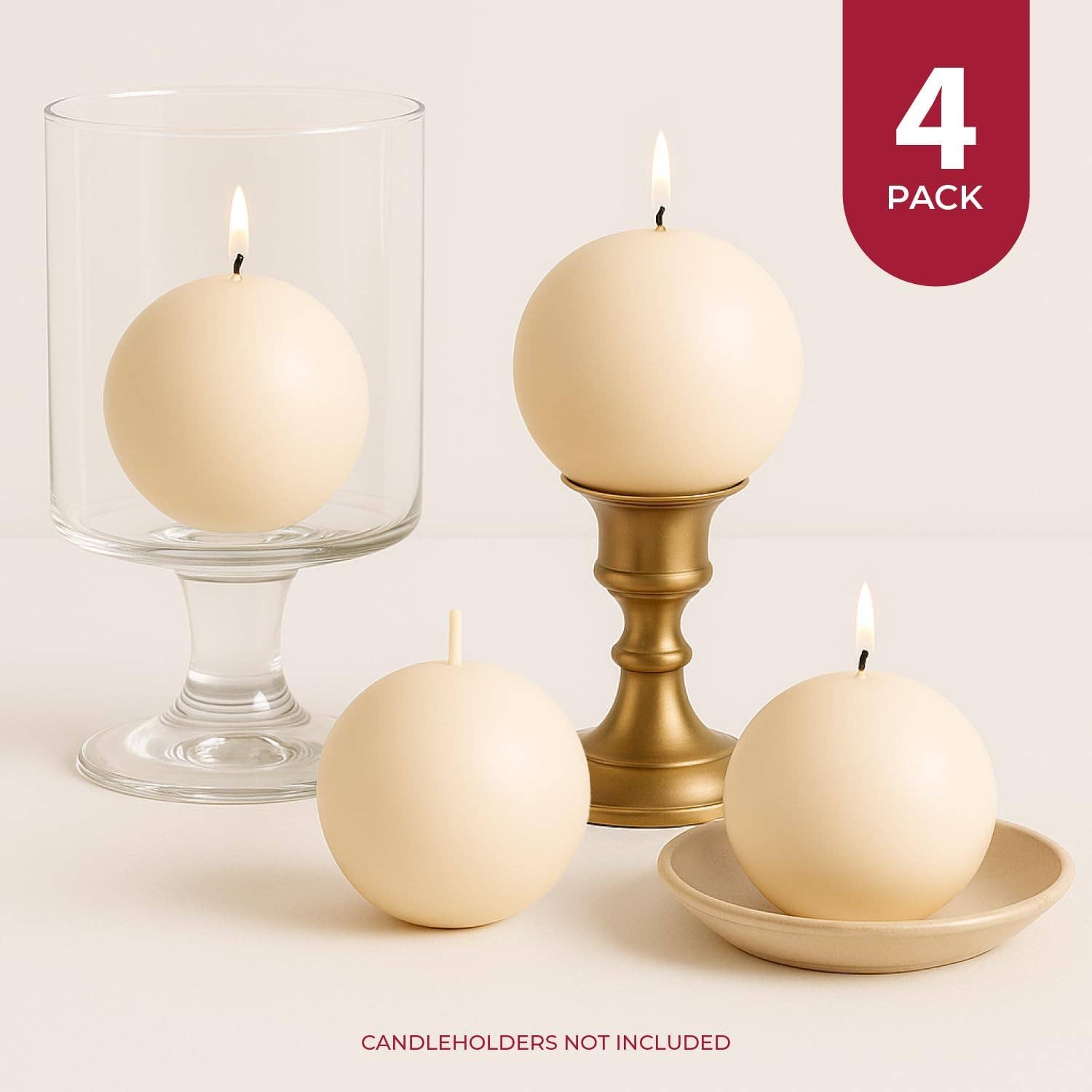Four unscented, cream-colored Champagne Ball Candles (2.5" diameter) are shown—two in holders and two on dishes—with a label for a 4-pack of decorative candles. Note: Candleholders not included; candles are unscented.