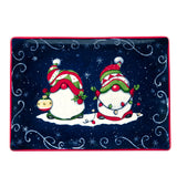 The Tray: Holiday Magic Christmas Gnomes – Rectangular Ceramic Platter (14" × 10") features two festive gnomes with a lantern and string lights on a snowy, starry dark blue background—a charming serving tray for holiday celebrations.