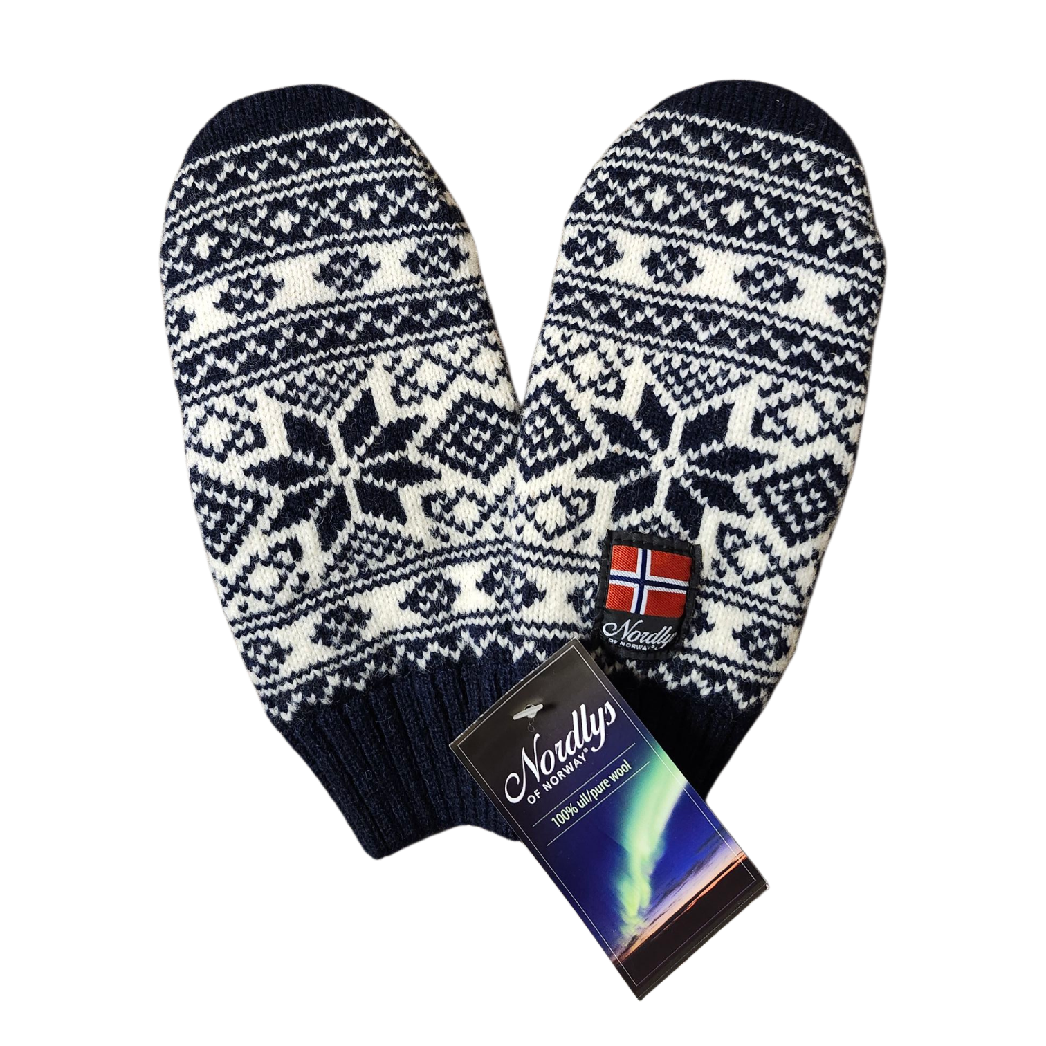 The Nordlys Men's Classic Norwegian Star Knit Mittens (Navy) feature navy and white Norwegian wool, a Nordic star pattern, Norwegian flag patch, and Nøadlys brand tag—highlighting authentic Scandinavian craftsmanship.