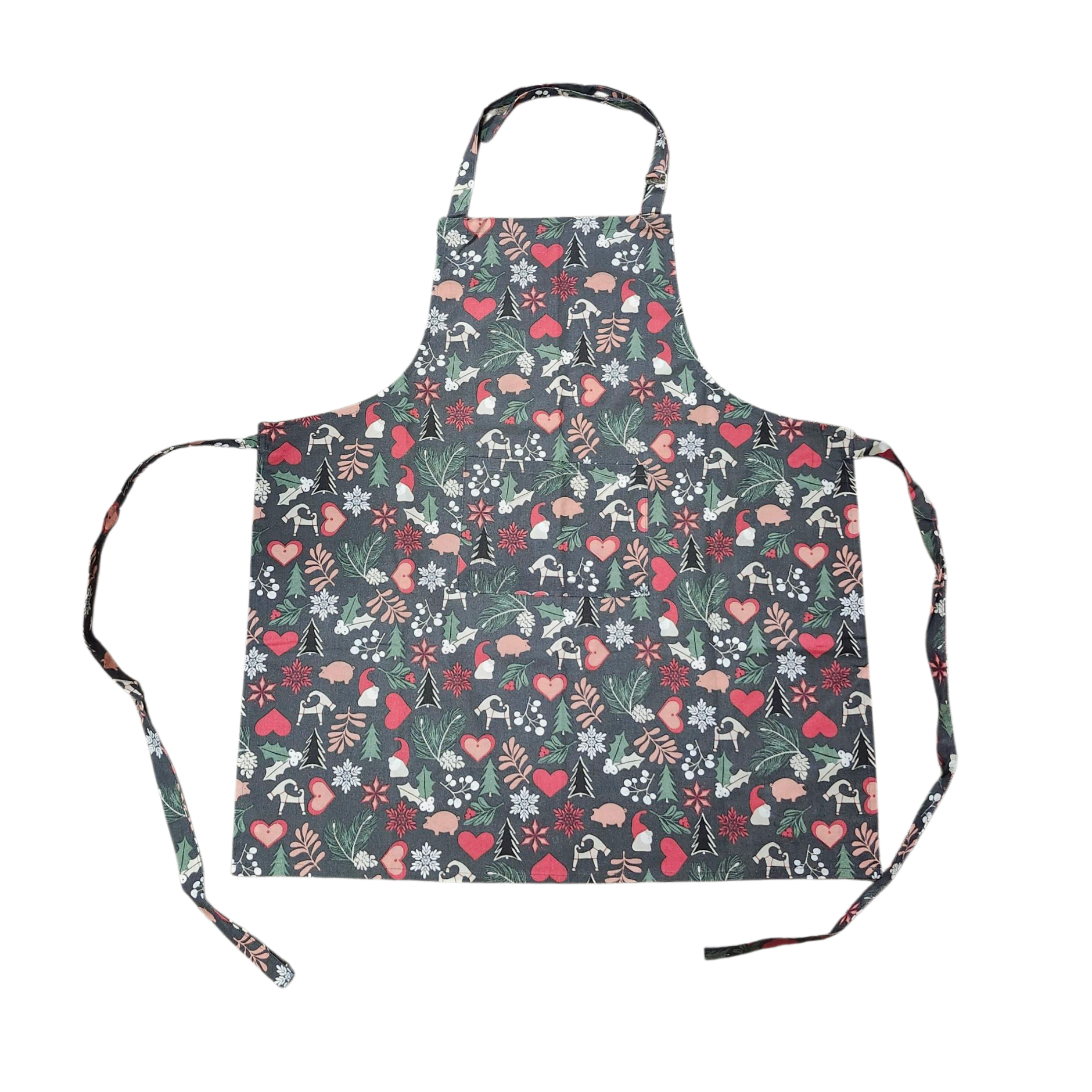 A dark grey "Julius" apron featuring Tomte, straw goats, pine trees, pigs, and hearts; includes neck and waist ties; shown on a white background.