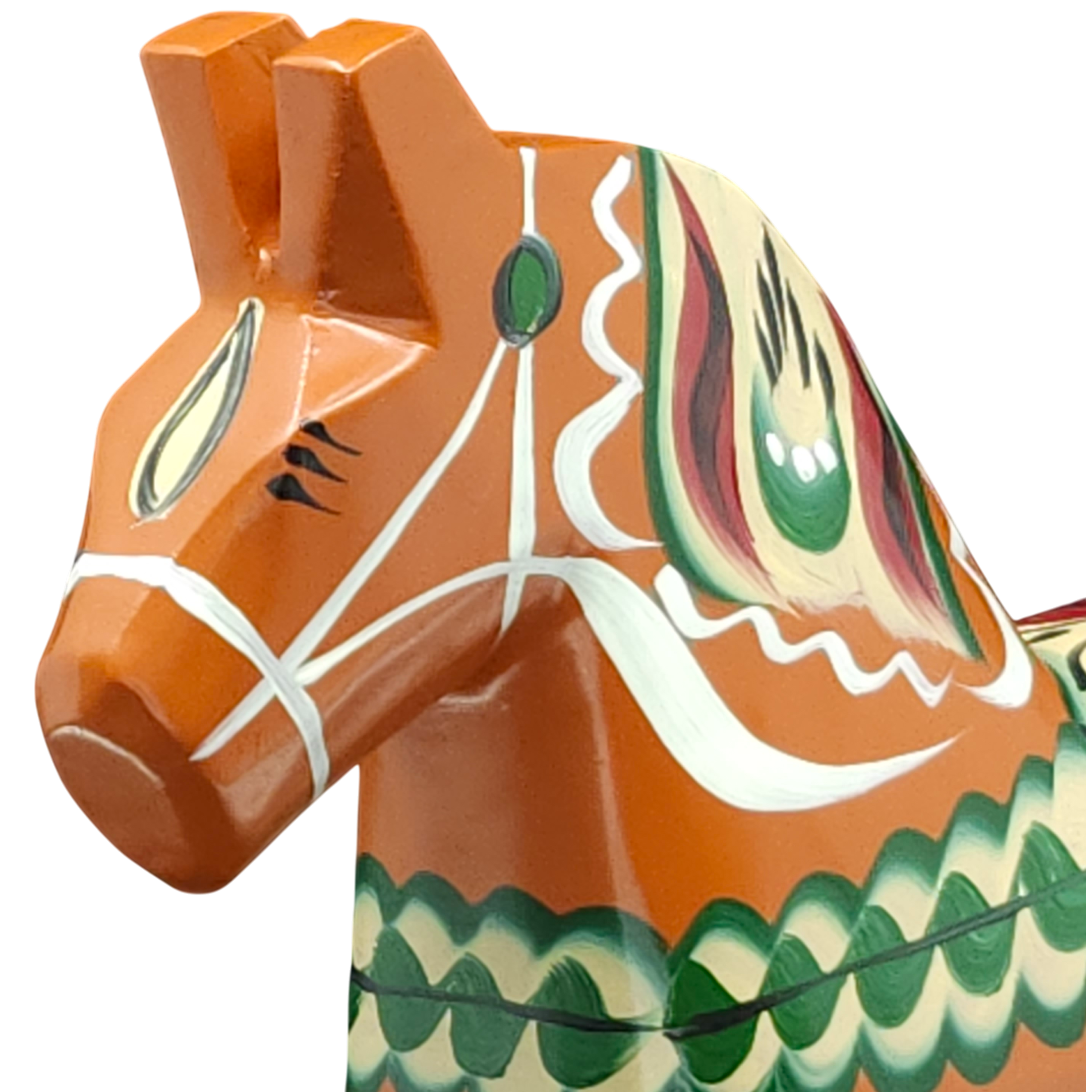 Close-up of the Dala Horse: Antique Inspired Swedish Dala Horse Red-Orange 17cm, hand carved and decorated with intricate green, white, and yellow painted patterns.