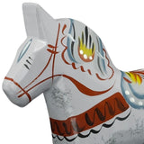 Close-up of the "Love Horse" Karlekshast Dala Horse figurine (13cm/5"), hand carved wood with painted decorative blue, yellow, red, and black patterns, inspired by traditional Swedish design.
