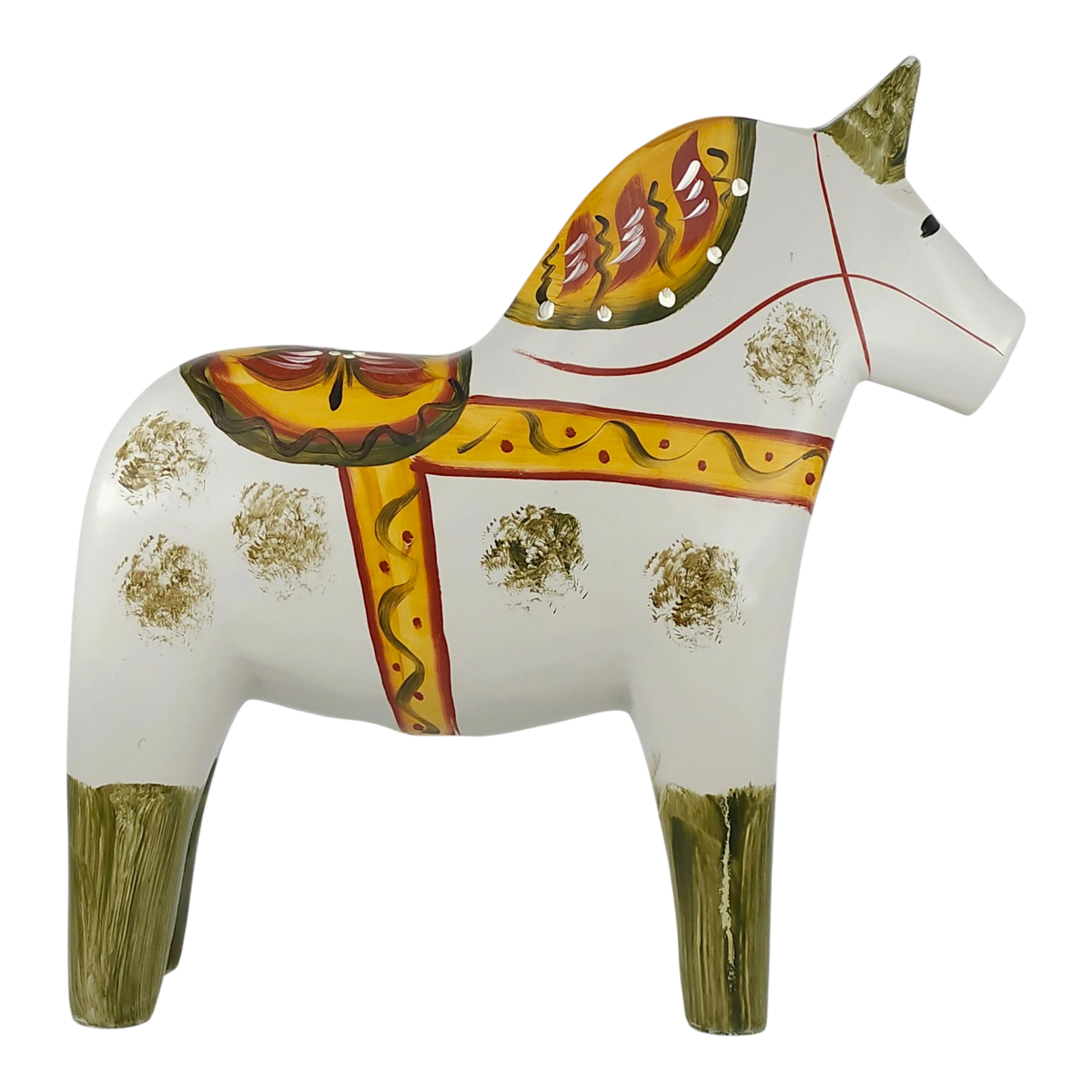 White hand-carved Dala horse with yellow, red, and green patterns, standing on all four legs and facing right.