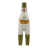 Front view of a Swedish Dala horse figurine with yellow and red neck decorations, green accents on legs and ears, set against a white background.